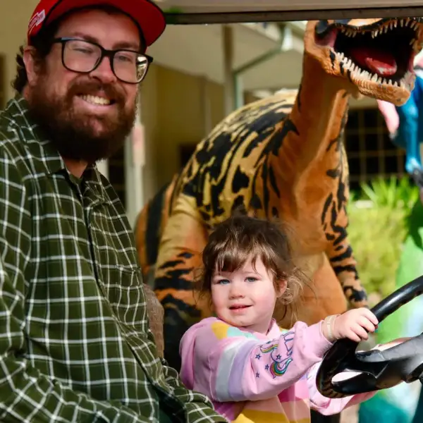 a man sitting on a motorcycle