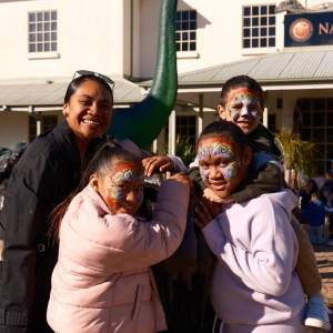 a man and a woman standing in front of a building