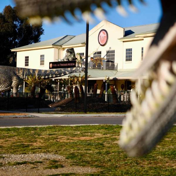 a sign in front of a building